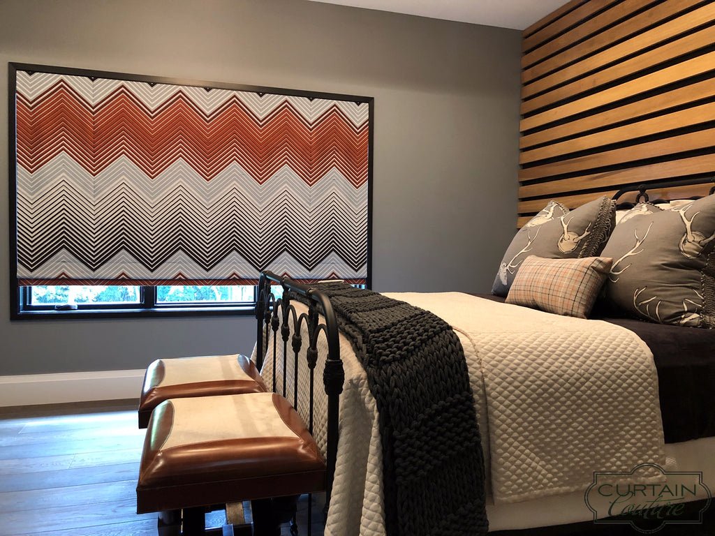 Contemporary Geometric Motorized Roman Shade sizzles in this bedroom. Designed by Kelly Stevenson & fabricated by Curtain Couture