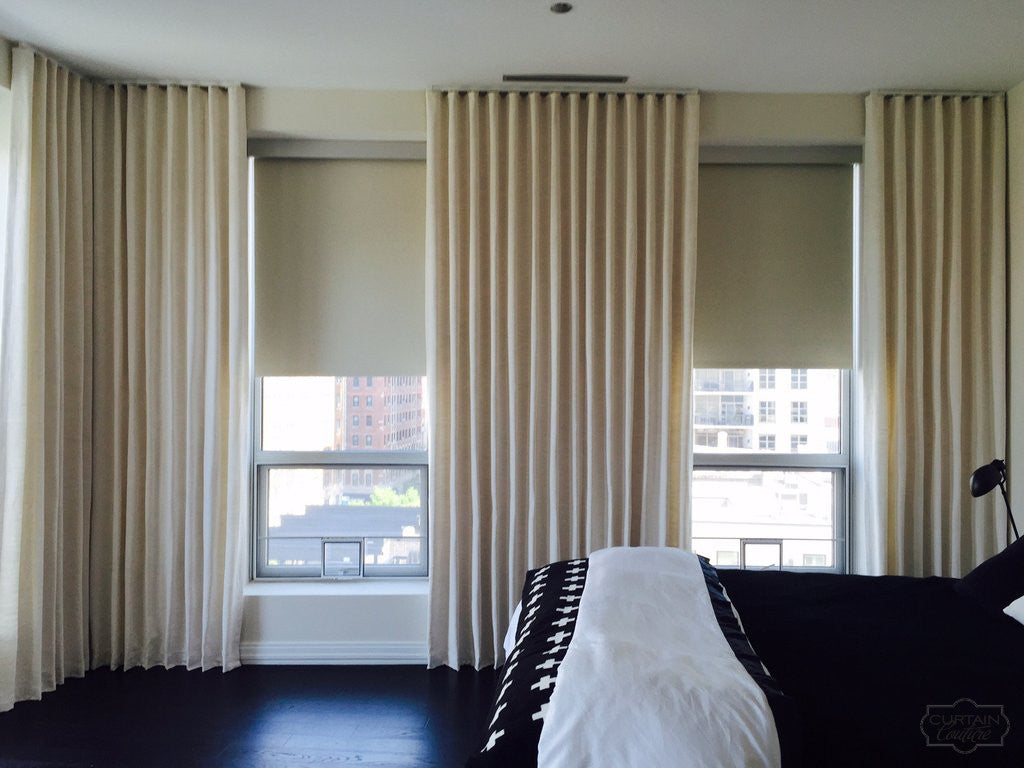 Stationary Ripple Fold Panels and Blackout Roller Shades by Alexandra Kaehler Design & Curtain Couture